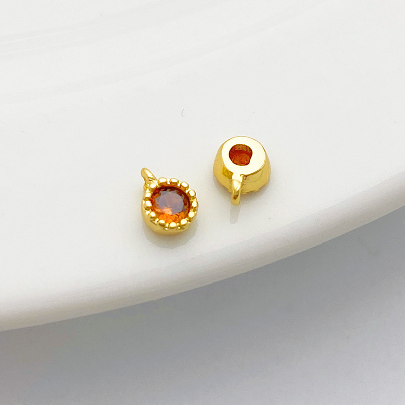 Gold Plated Rimmed Round Colored Zircon Charm