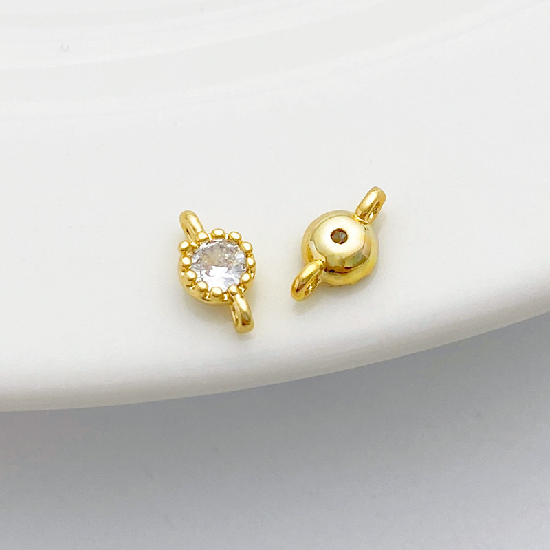 Gold Plated Rimmed Round Colored Zircon Charm