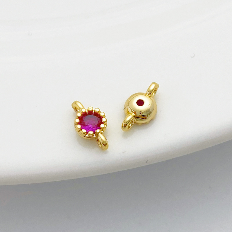 Gold Plated Rimmed Round Colored Zircon Charm