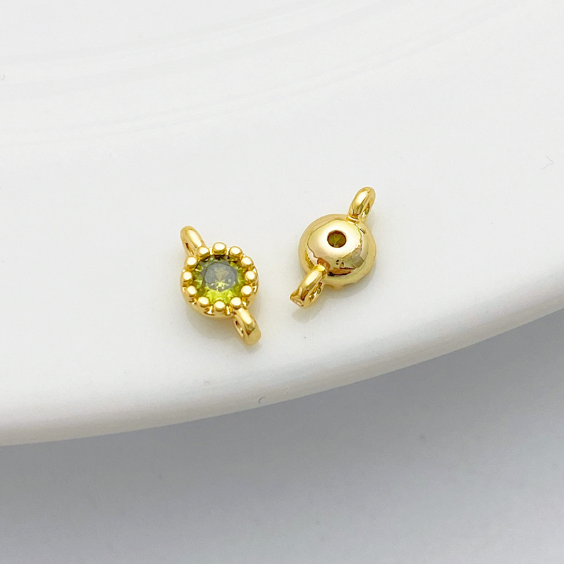 Gold Plated Rimmed Round Colored Zircon Charm