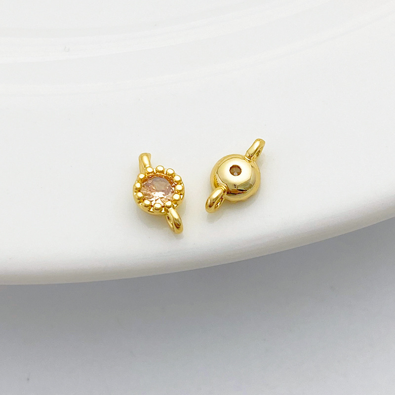 Gold Plated Rimmed Round Colored Zircon Charm