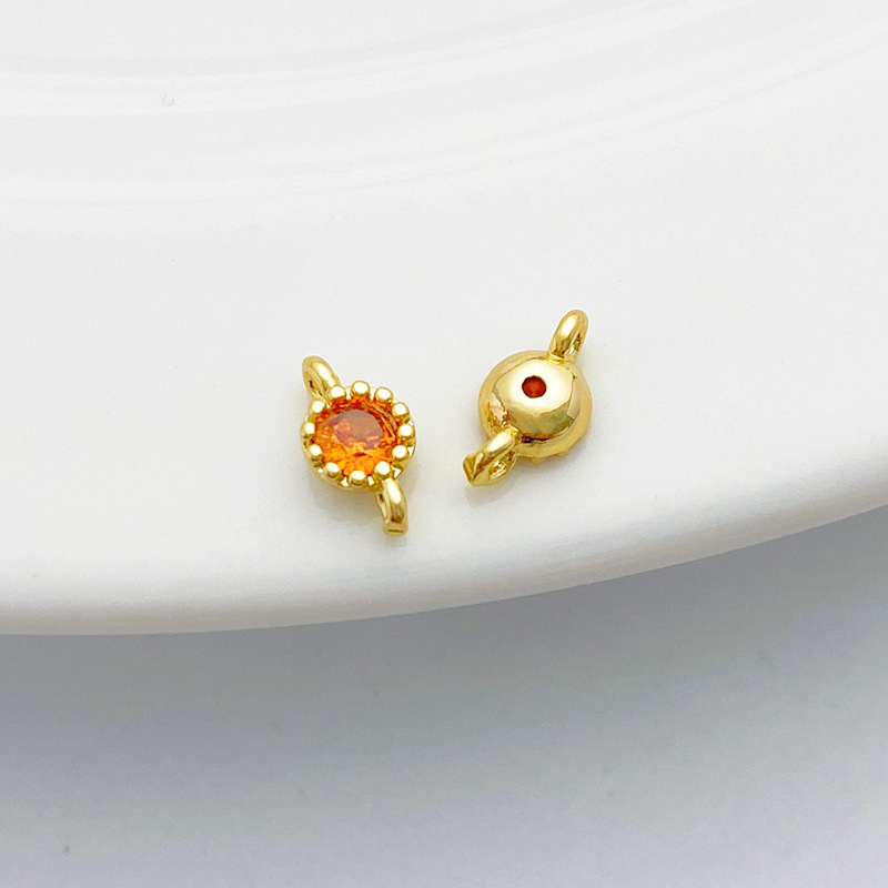 Gold Plated Rimmed Round Colored Zircon Charm