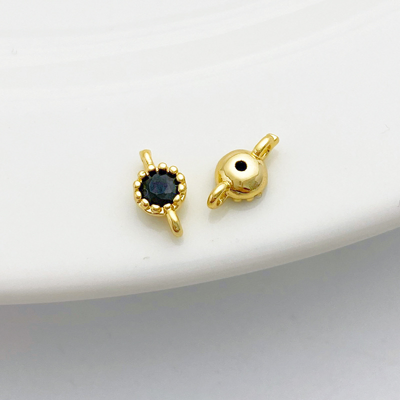 Gold Plated Rimmed Round Colored Zircon Charm