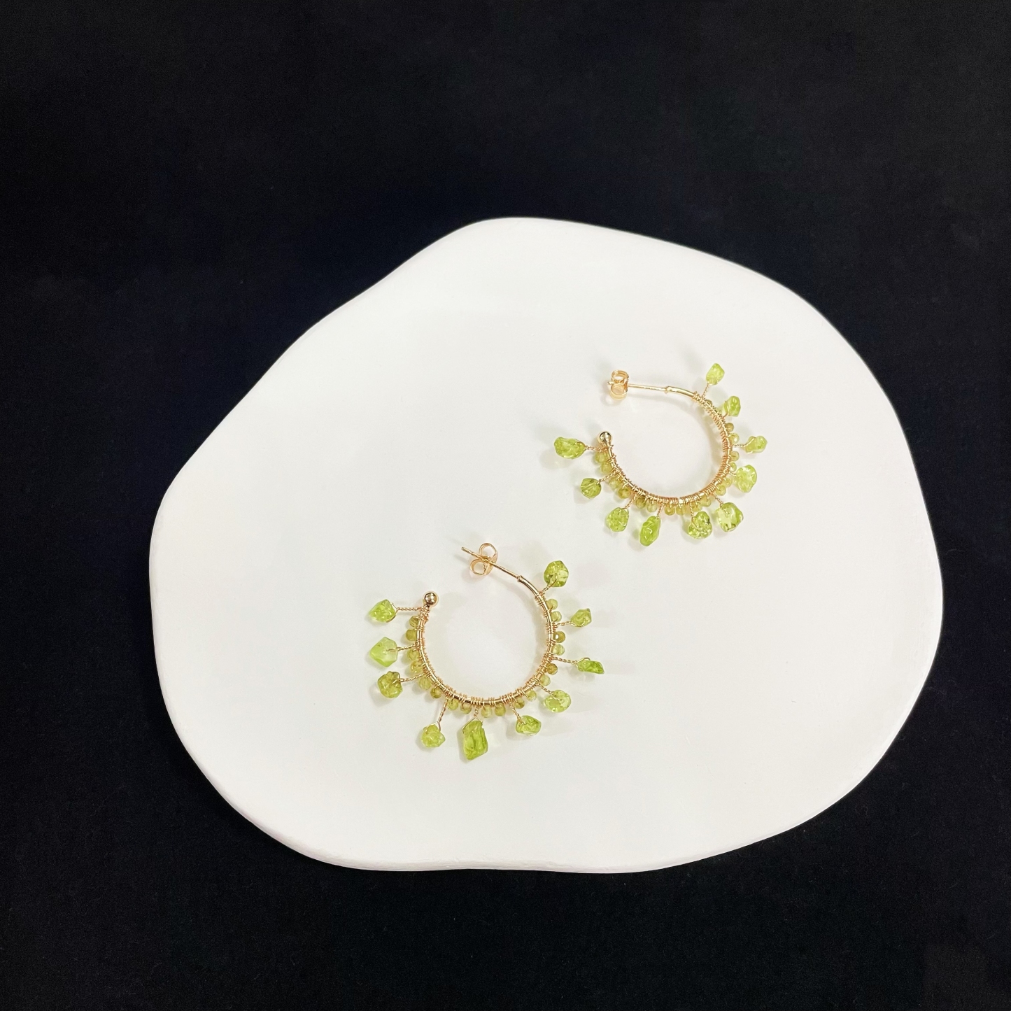 Enchanting Peridot Circle Earrings: A Spring Symphony