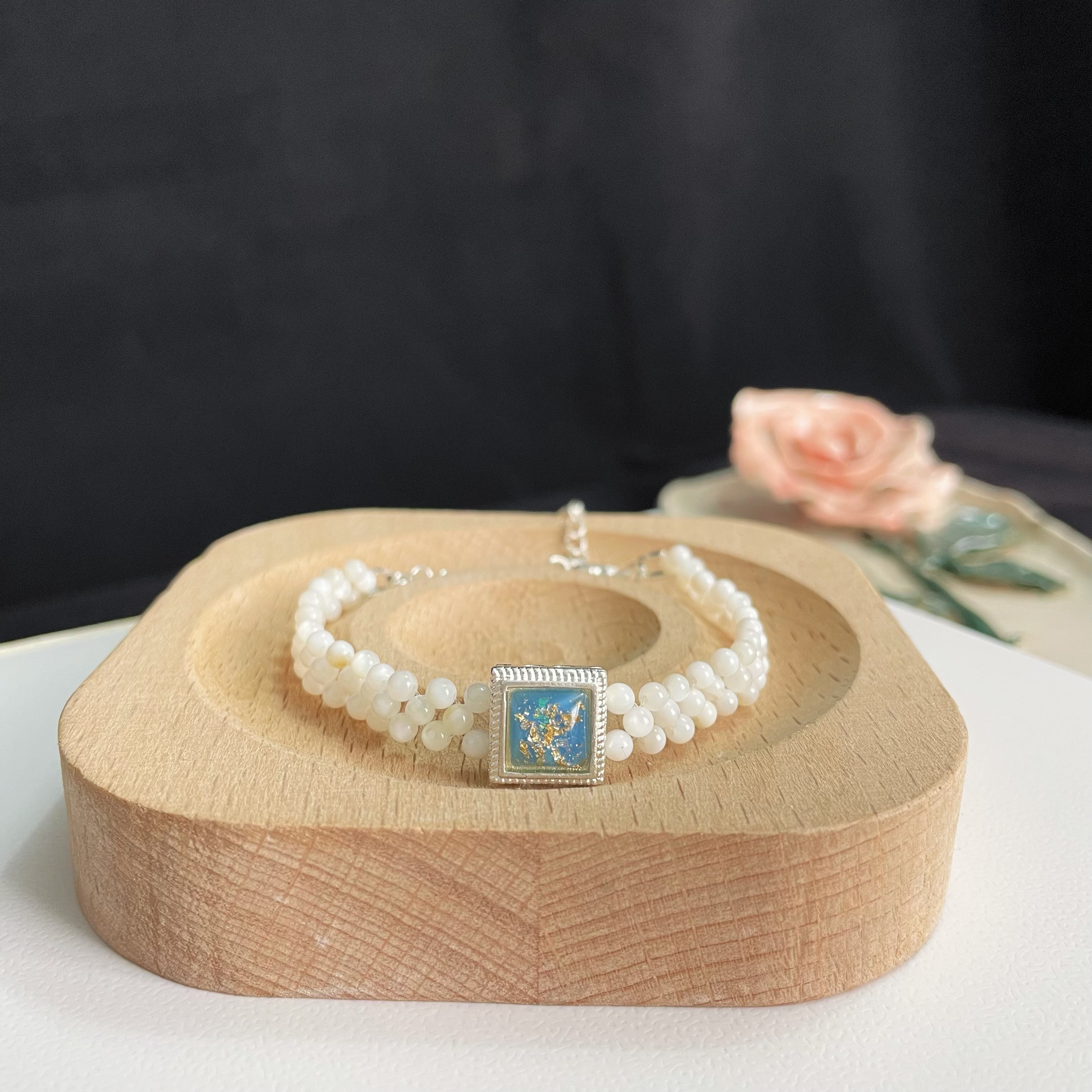Handcrafted Woven Mother-of-Pearl Beads Bracelet with Blue Square Stone Accent