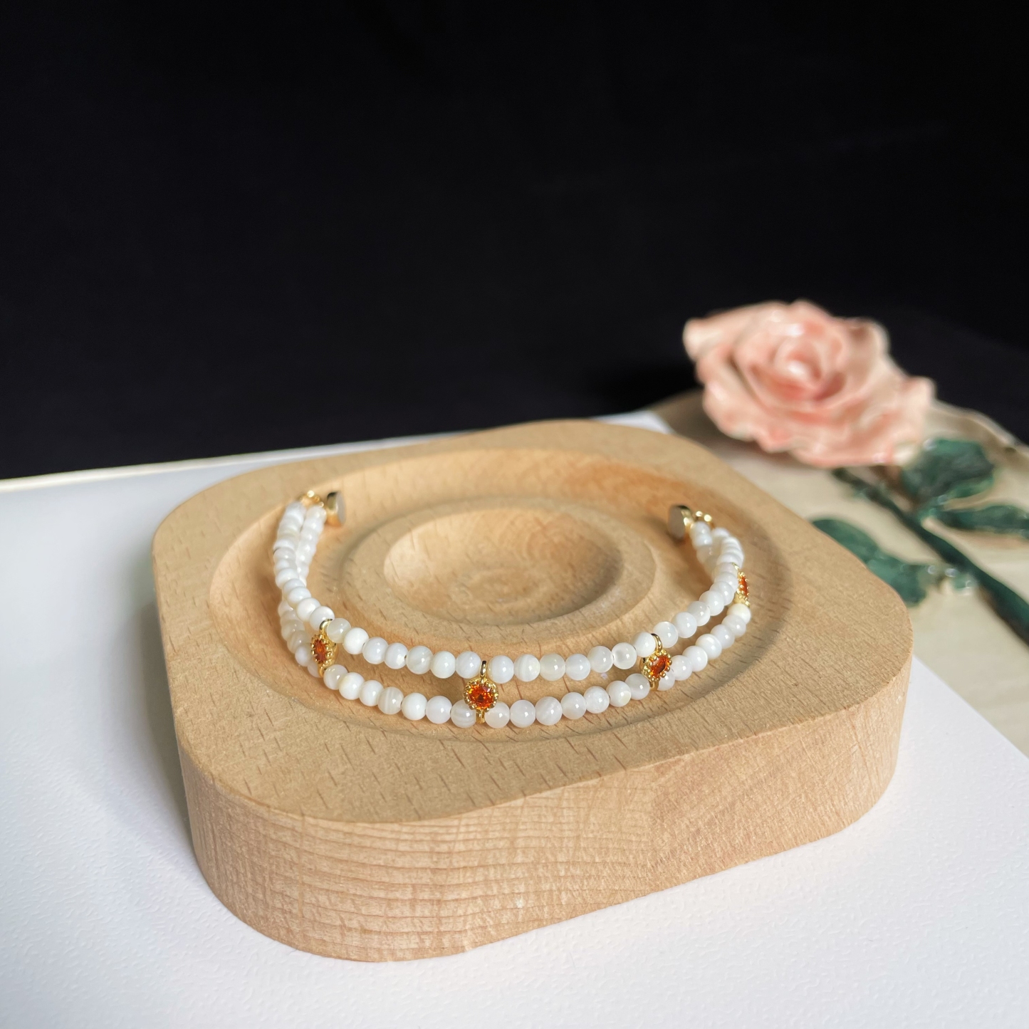 Elegant Double Line Mother-of-Pearl Bracelet with Orange Zircon