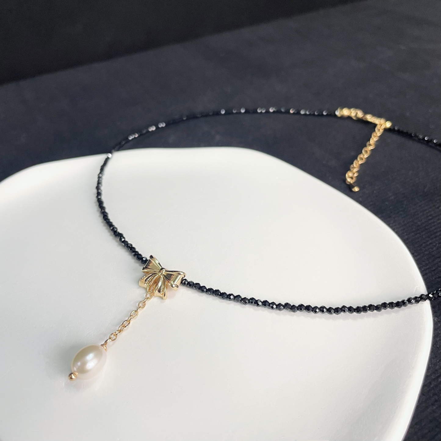 Black Spinel Necklace with Delicate Bow