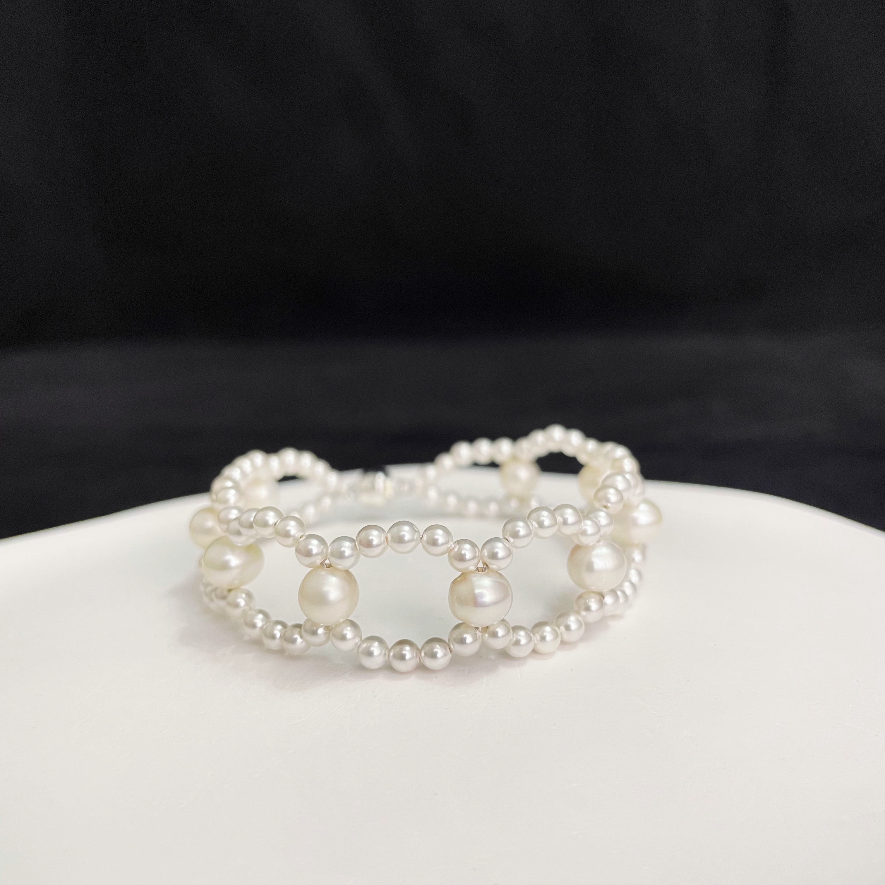 Elegant Woven Pearls Bracelet