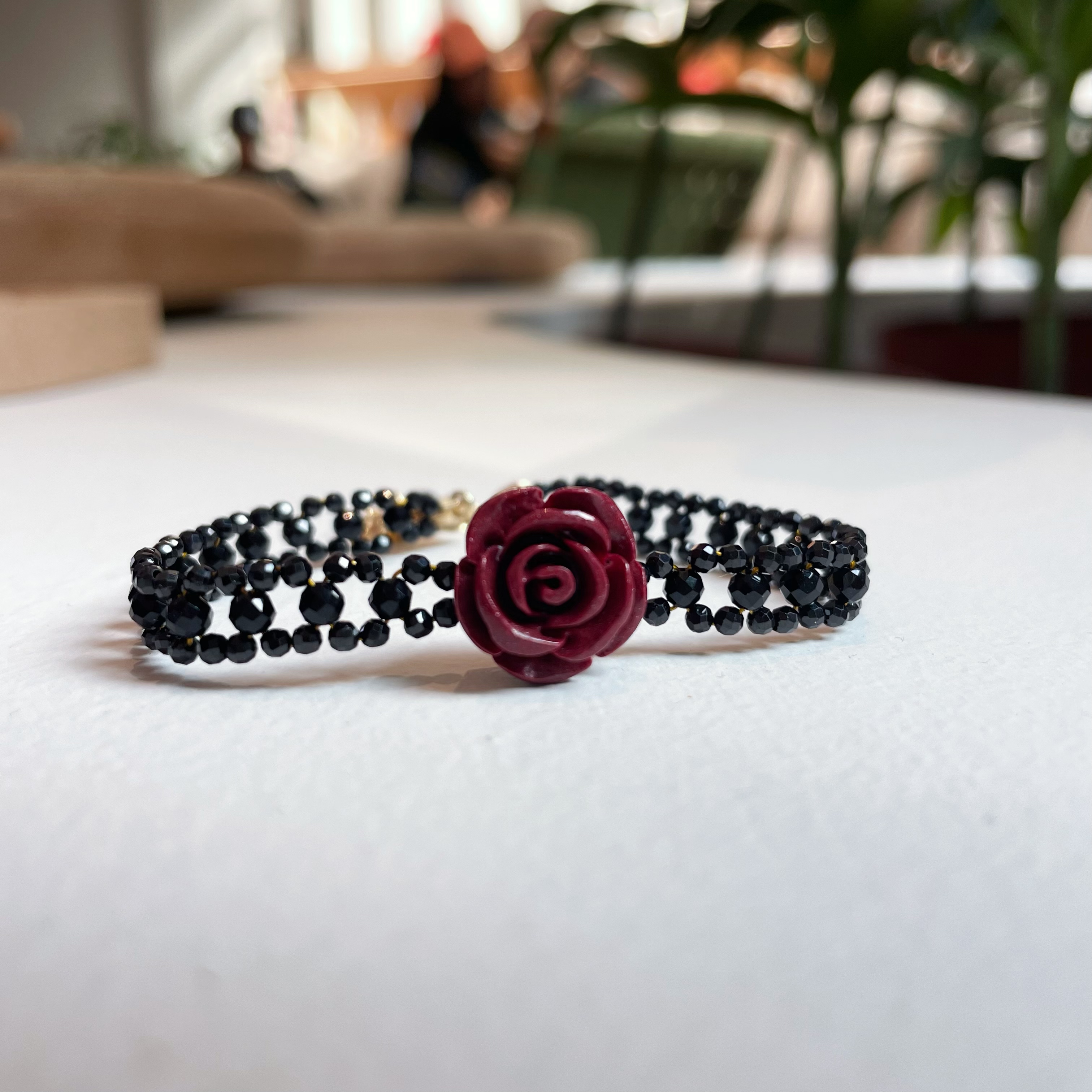 Woven Black Spinels Lace with Vermilion Stone Carved Rose Bracelet