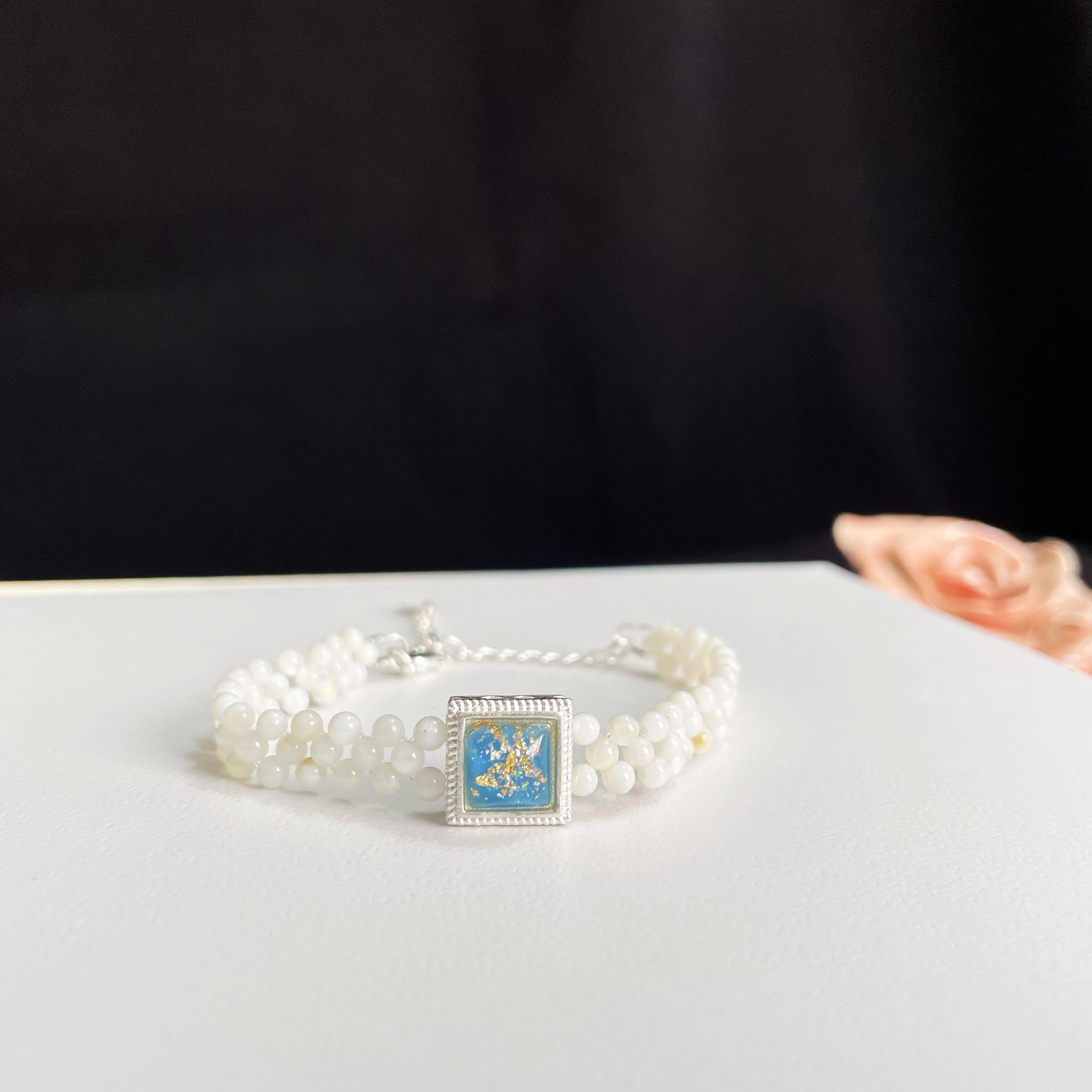 Handcrafted Woven Mother-of-Pearl Beads Bracelet with Blue Square Stone Accent