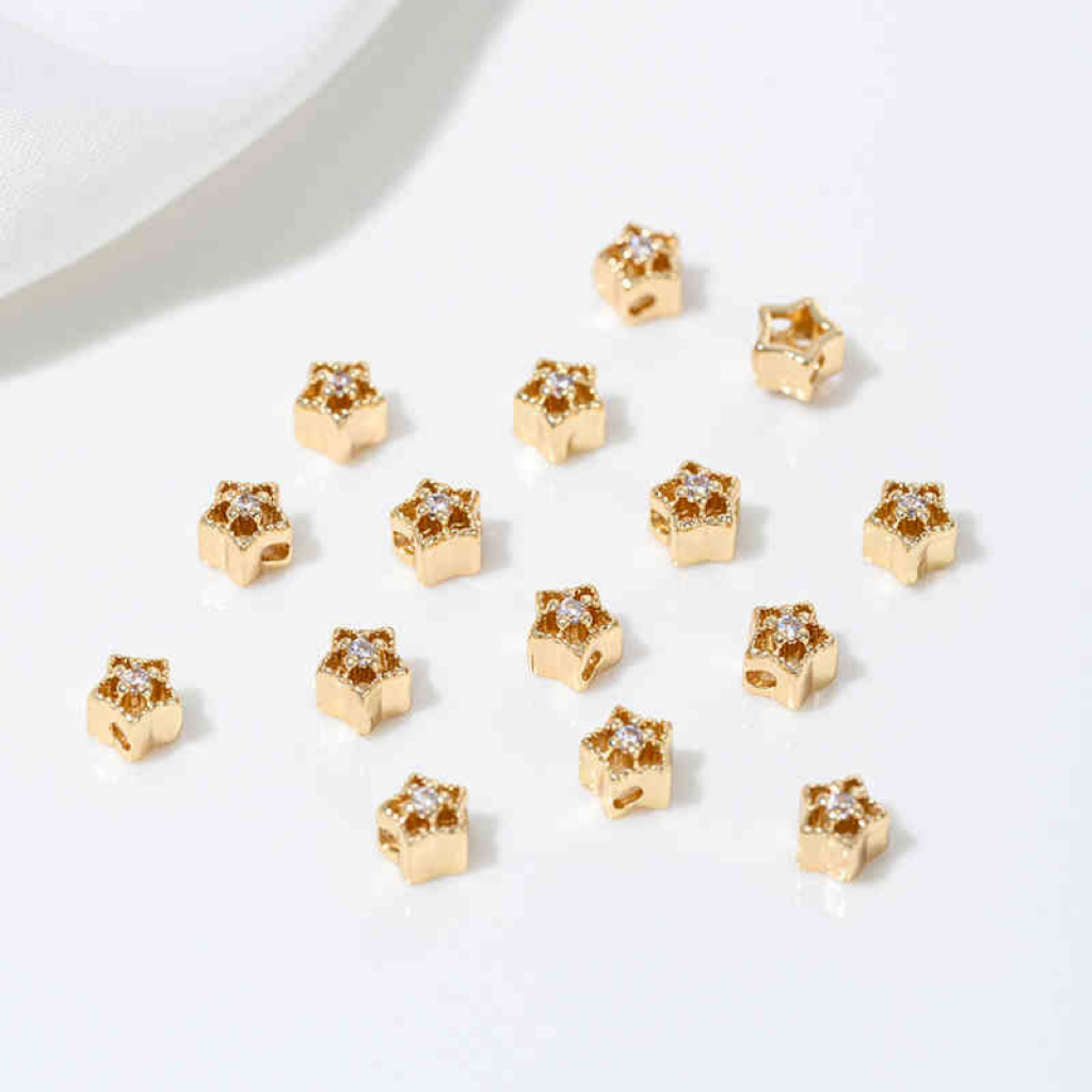 Zirconia Inlaid Gold Plated Hollow Star Spacer Bead