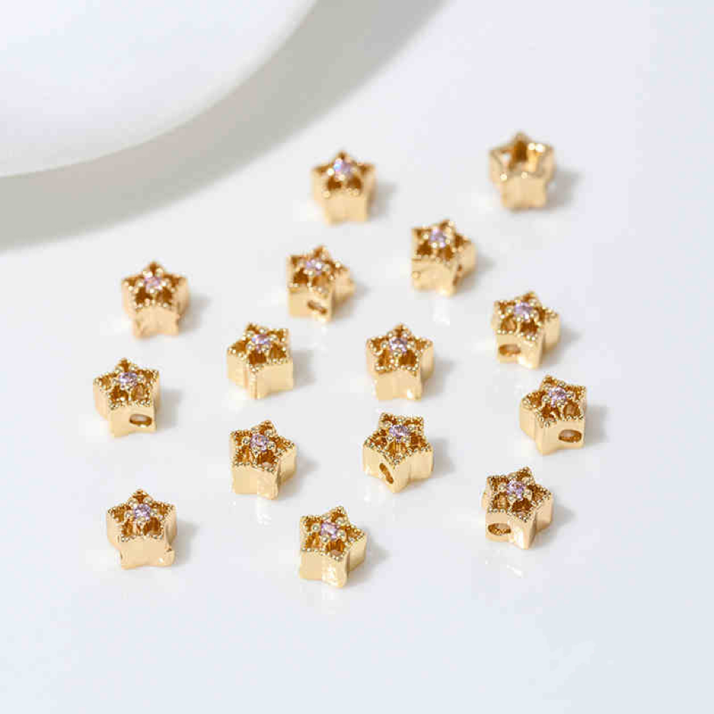Zirconia Inlaid Gold Plated Hollow Star Spacer Bead