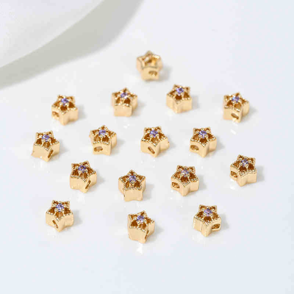 Zirconia Inlaid Gold Plated Hollow Star Spacer Bead
