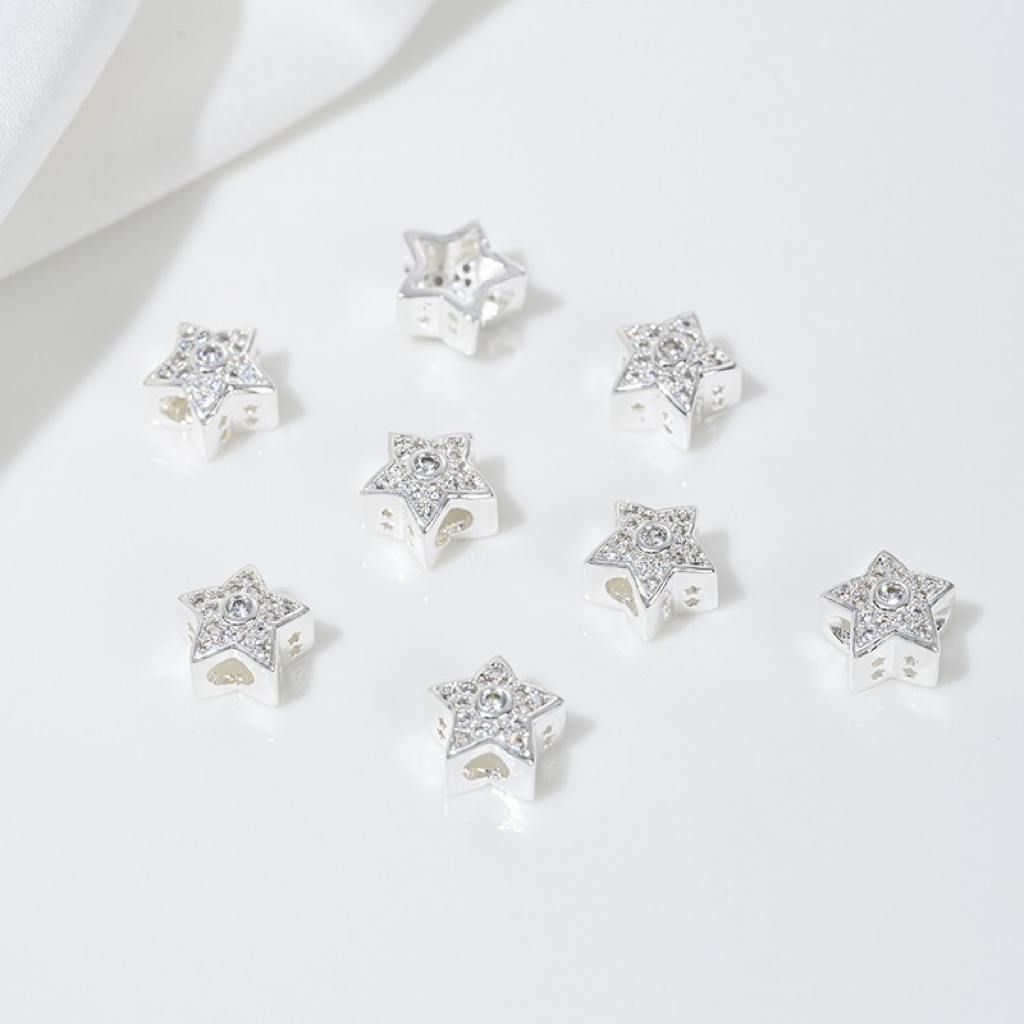 Zirconia Inlaid Gold Plated Hollow Star Spacer Bead