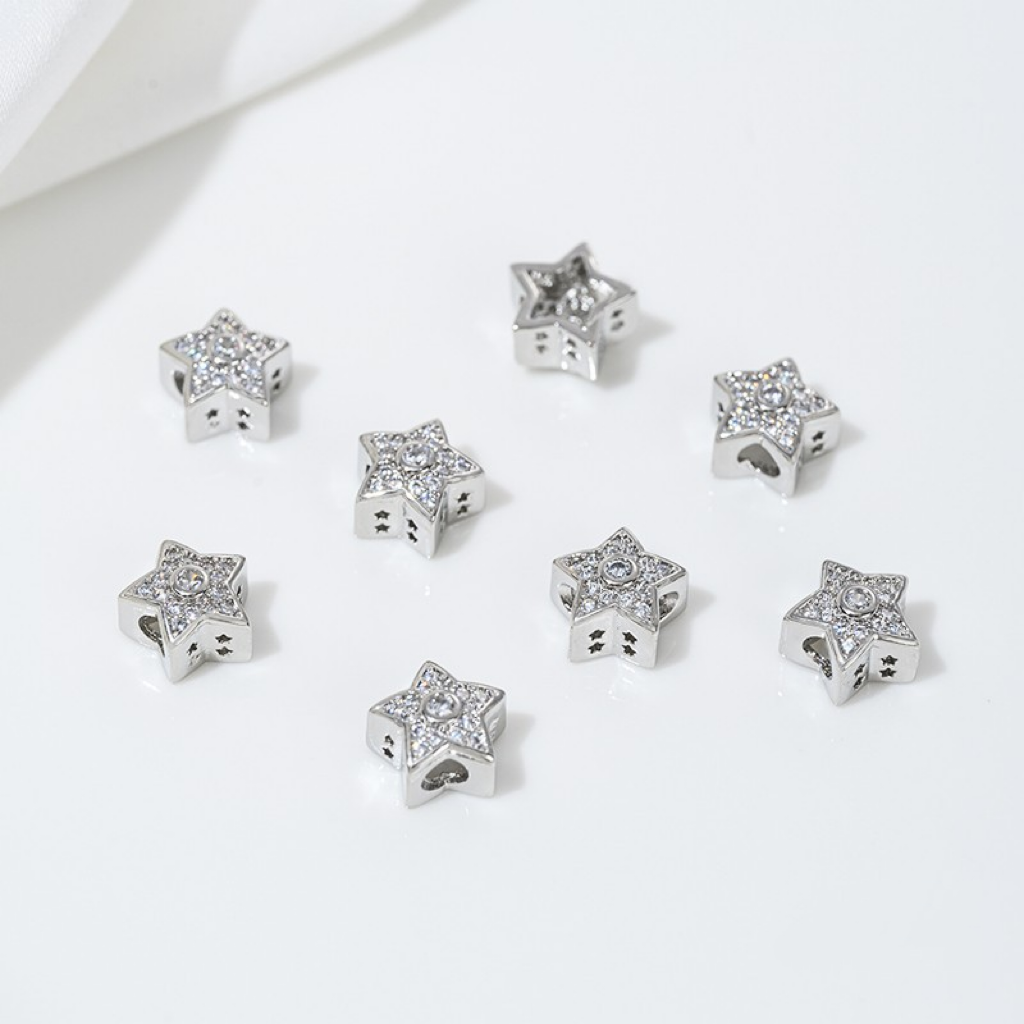Zirconia Inlaid Gold Plated Hollow Star Spacer Bead