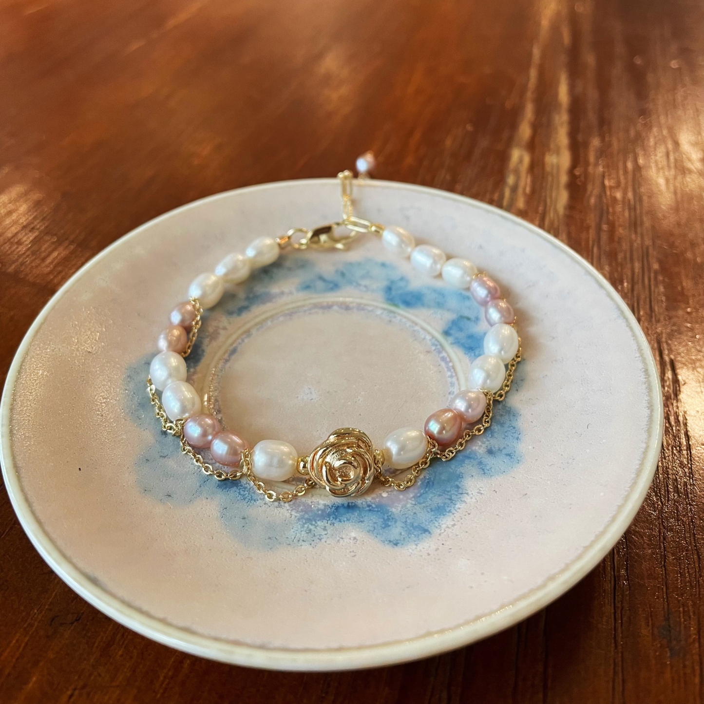 Handmade Elegant White and Purple Freshwater Pearl Bracelet with Rose Accent 