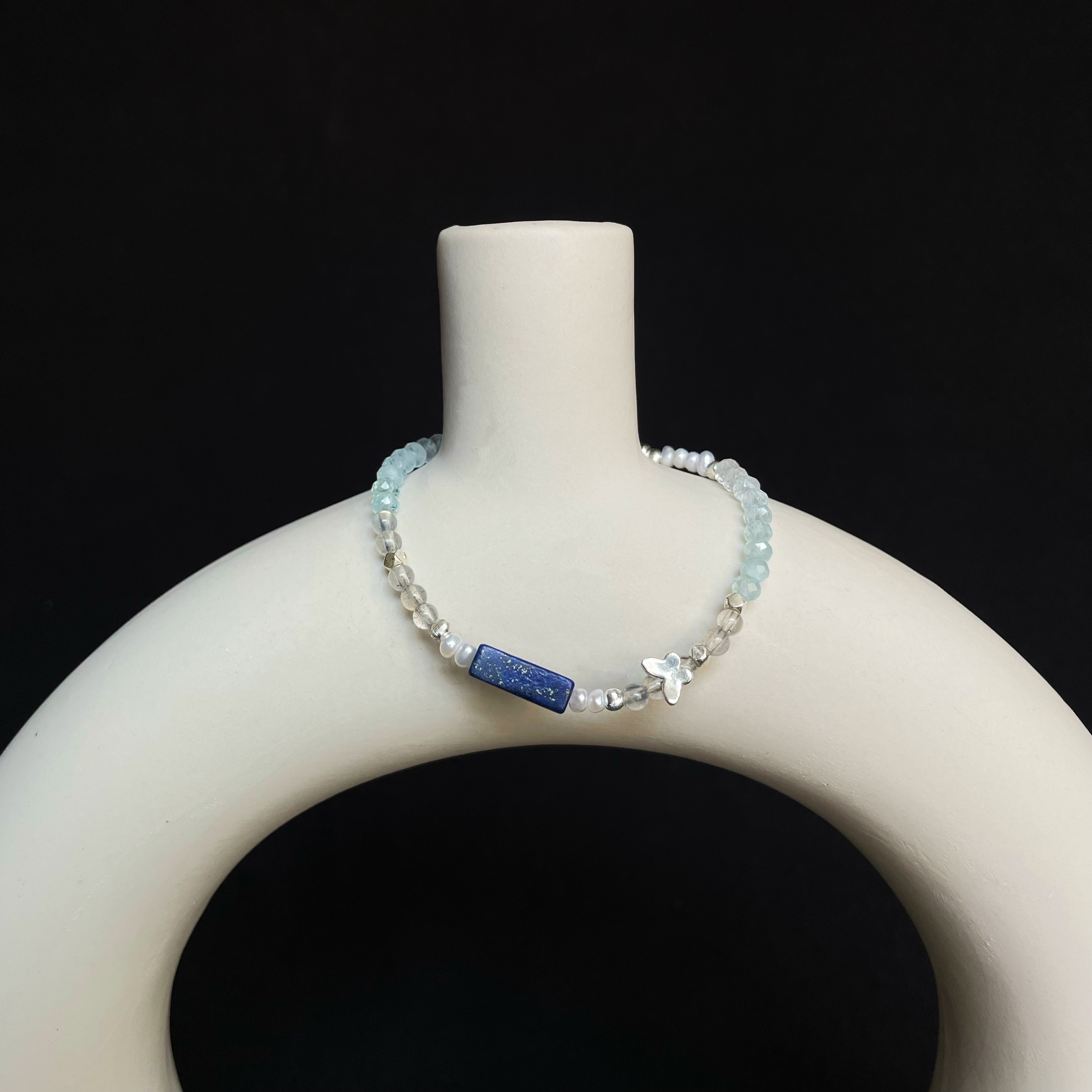 Handmade Freshwater Pearls Aquamarine and Labradorite beads Bracelet with Lapis Lazuli Centre and Sterling Silver Butterfly Charm