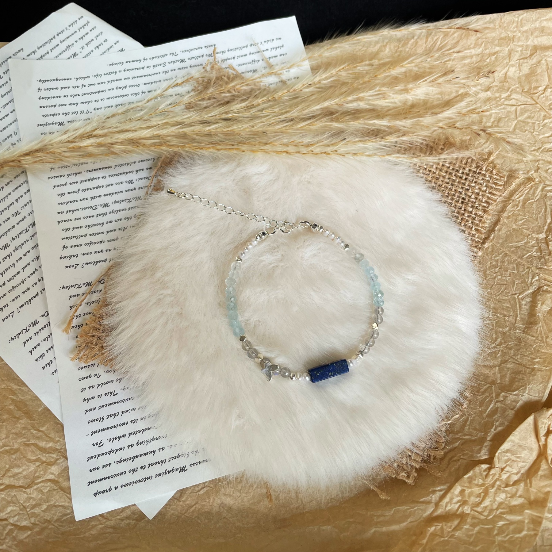 Handmade Freshwater Pearls Aquamarine and Labradorite beads Bracelet with Lapis Lazuli Centre and Sterling Silver Butterfly Charm