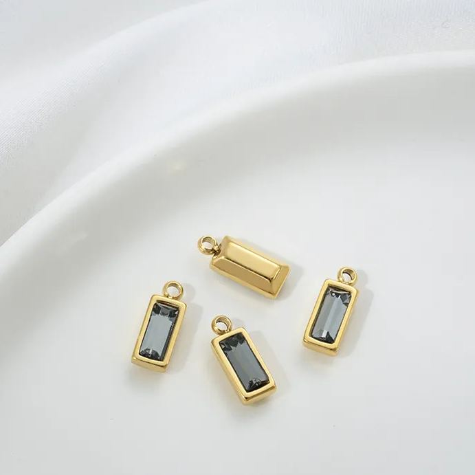 9*4.5mm Colored Zircon Inlaid 14k Gold Plated Titanium Steel Pendant