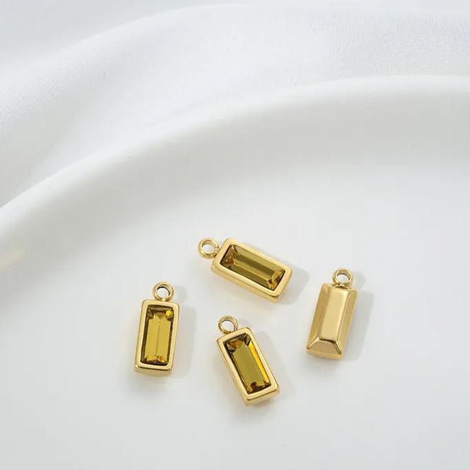 9*4.5mm Colored Zircon Inlaid 14k Gold Plated Titanium Steel Pendant