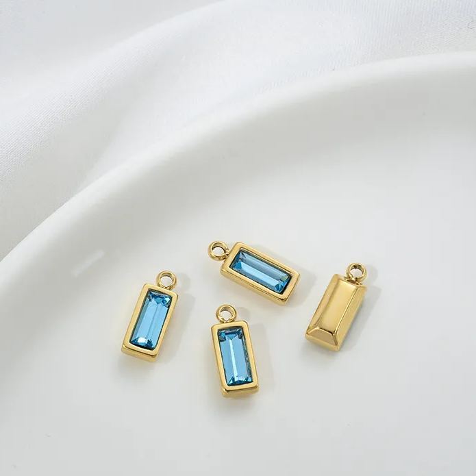 9*4.5mm Colored Zircon Inlaid 14k Gold Plated Titanium Steel Pendant