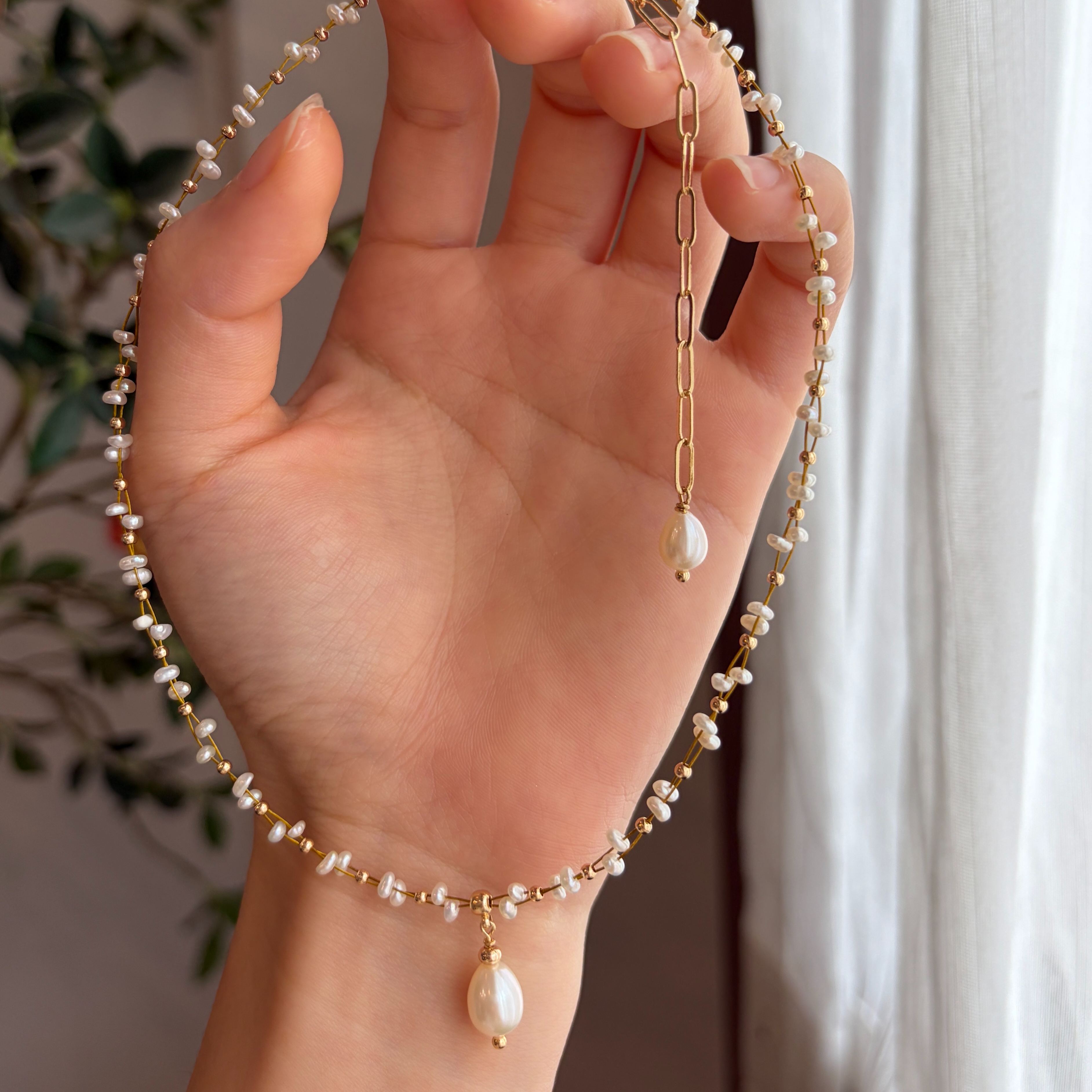 Handmade Dual Line Pearls Satellite Necklace with a Rice-Shaped Pendant