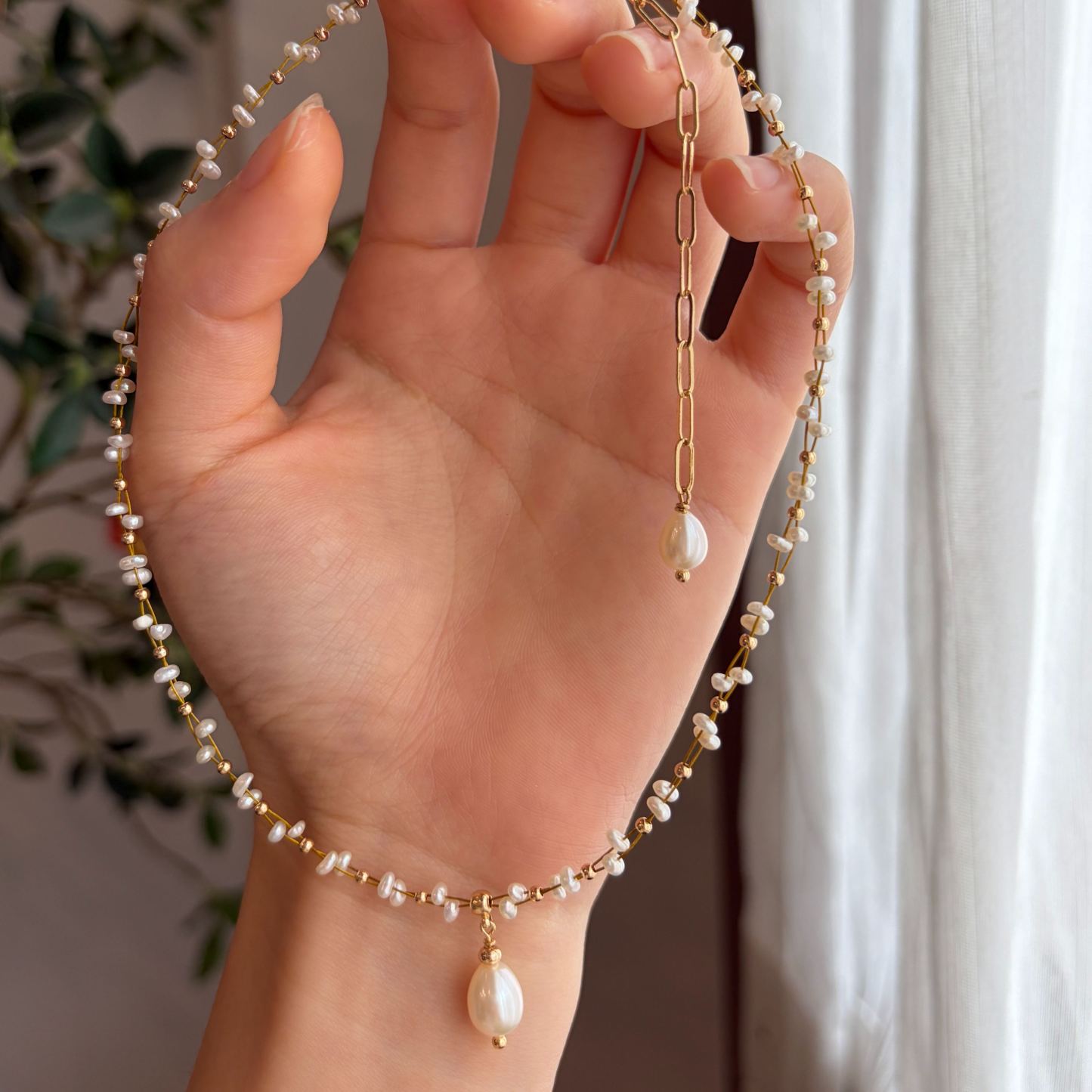 Handmade Dual Line Pearls Satellite Necklace with a Rice-Shaped Pendant