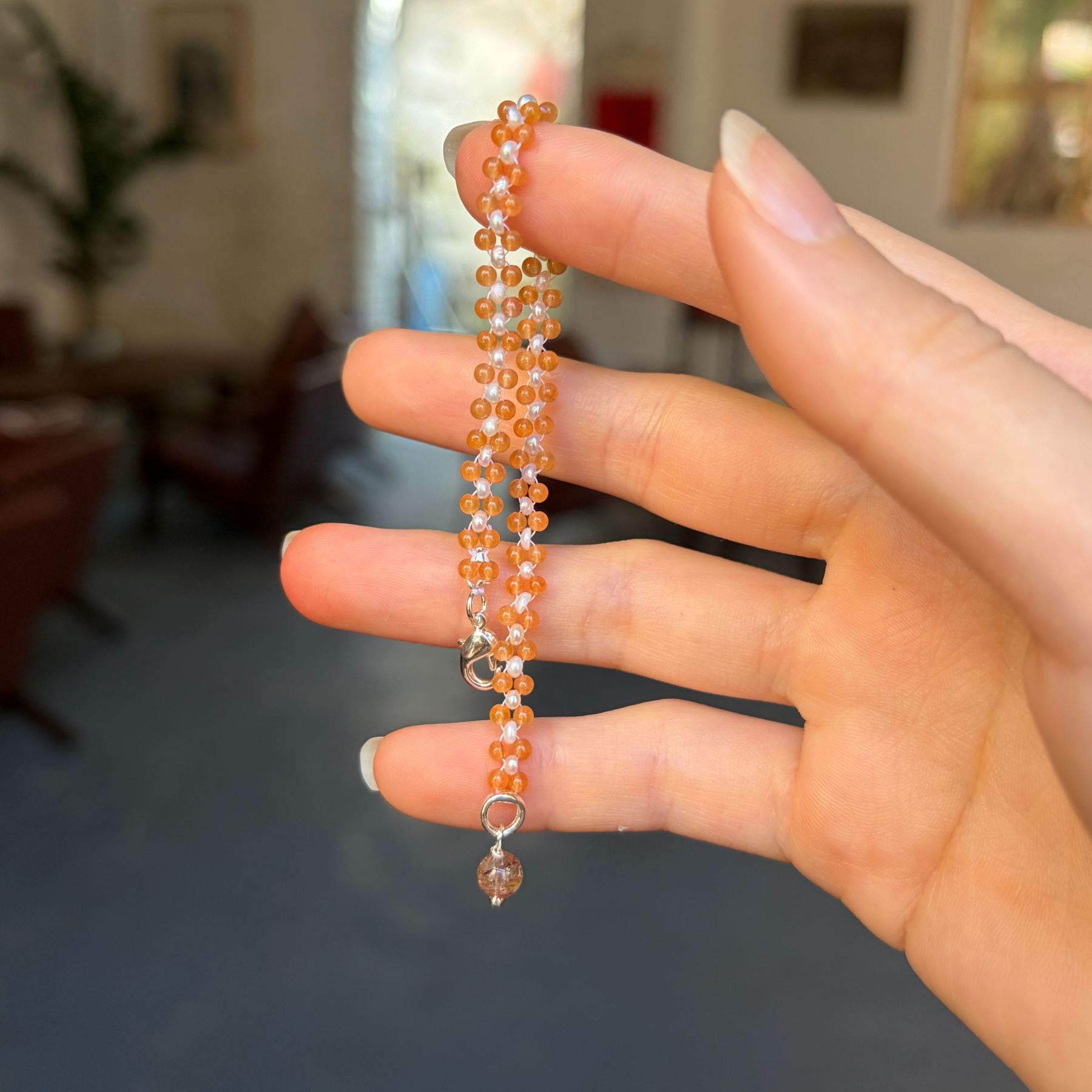 Sunlit — Red Aventurine & Freshwater Pearl Bracelet with Super Seven Charm