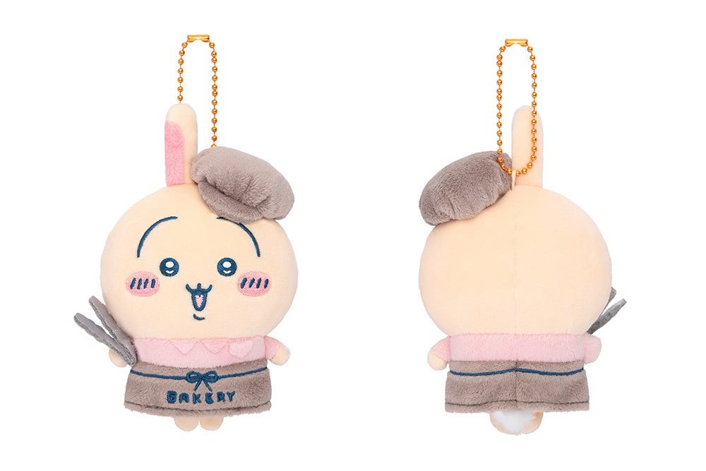 Usagi staff mascot in a bakery uniform holding silver tongs