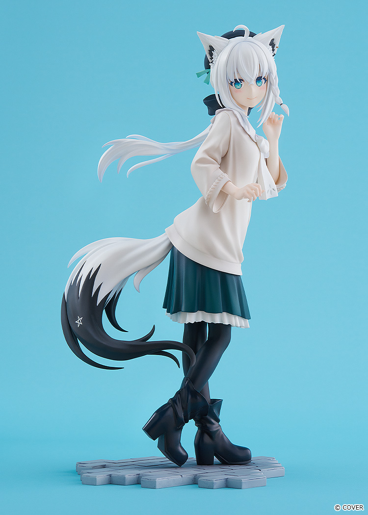 Shirakami Fubuki Date Style figure against a light blue backdrop, glancing over her shoulder in a loose white top, green skirt and black boots, with her white tail sweeping behind her
