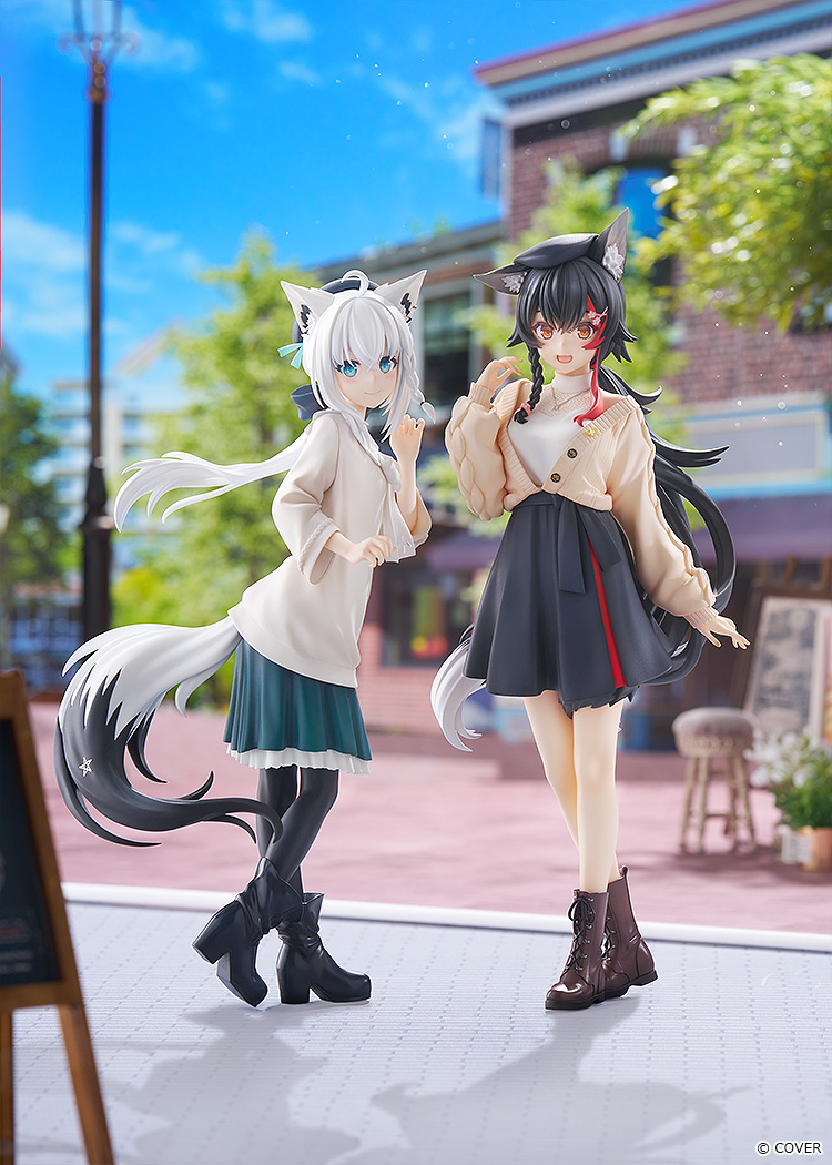 G.S. Collection Shirakami Fubuki and Ookami Mio Date Style figures standing side by side on a paved town street with trees and brick buildings behind them