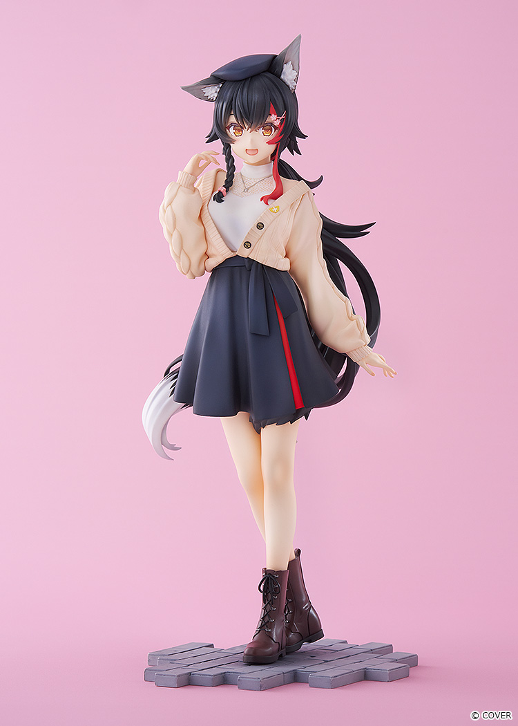 Ookami Mio Date Style figure against a pink backdrop in a cream knitted cardigan, dark navy skirt with a red stripe, brown boots and a black beret, raising one hand