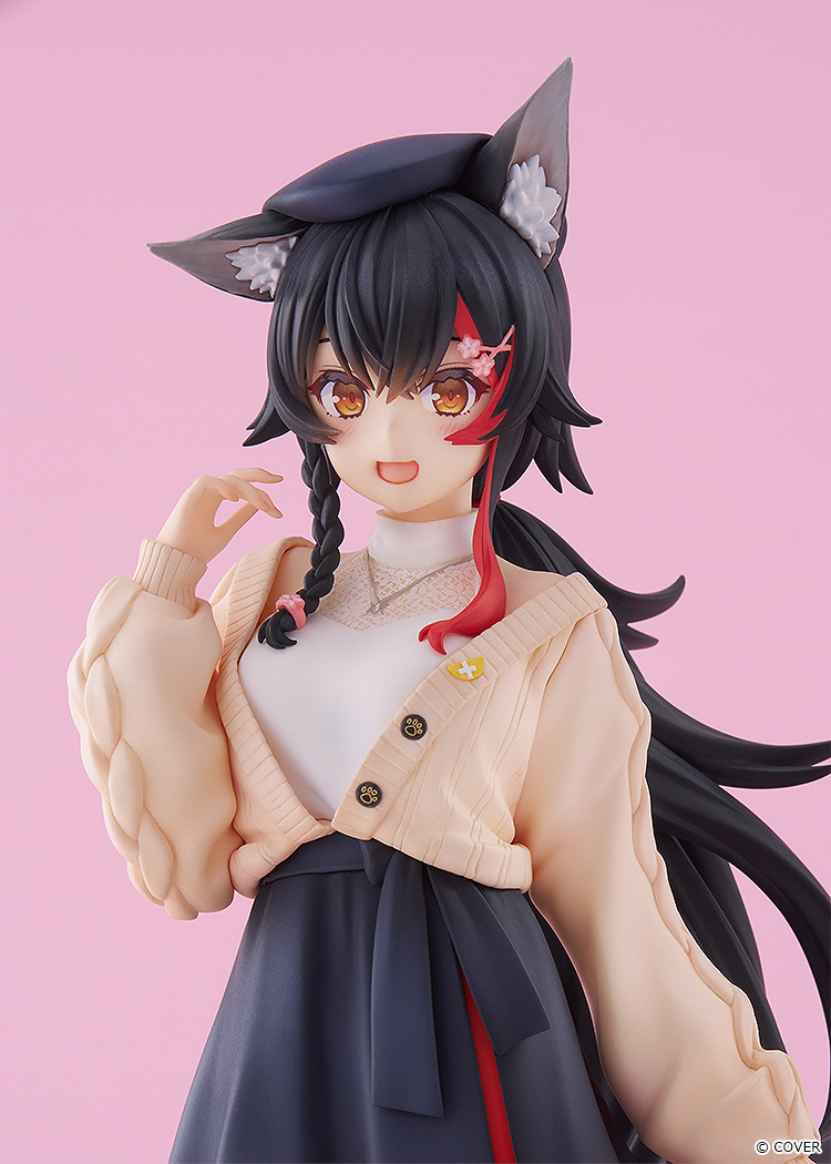 Close-up of the Mio figure smiling with amber eyes, black wolf ears, a red streak and red hair clip in her long black hair and a black beret
