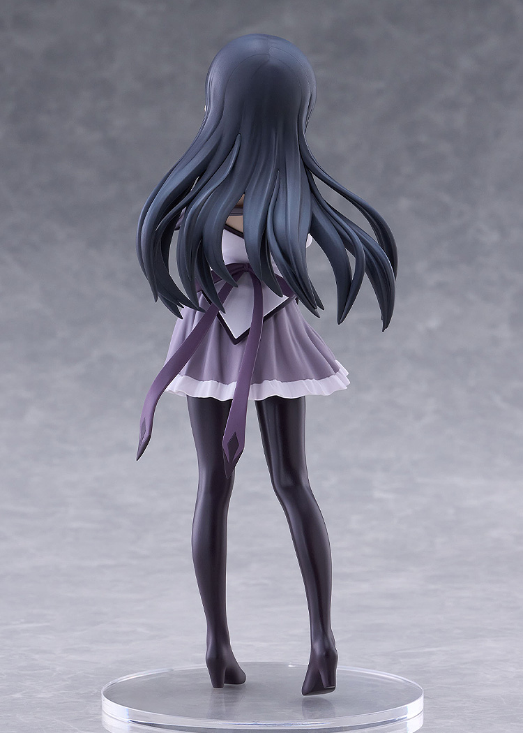 Back view of the Akemi Homura figure showing her waist-length black hair, purple ribbon details and dark thigh-high boots on the clear base