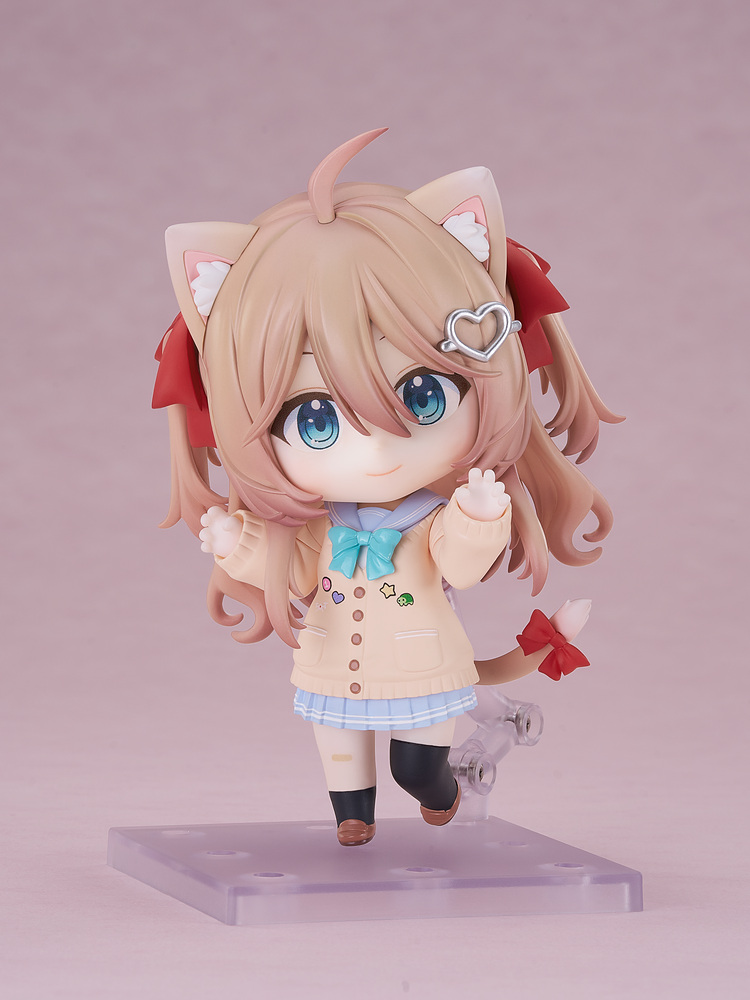 Nendoroid Neuro-sama wearing the optional cat ears and a cat tail tied with a red bow, smiling with both paws raised