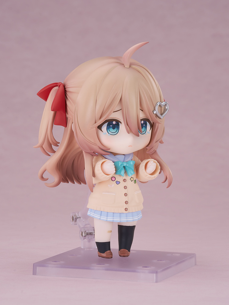 Nendoroid Neuro-sama with the sad face plate, teary blue eyes and both fists held up to her chest