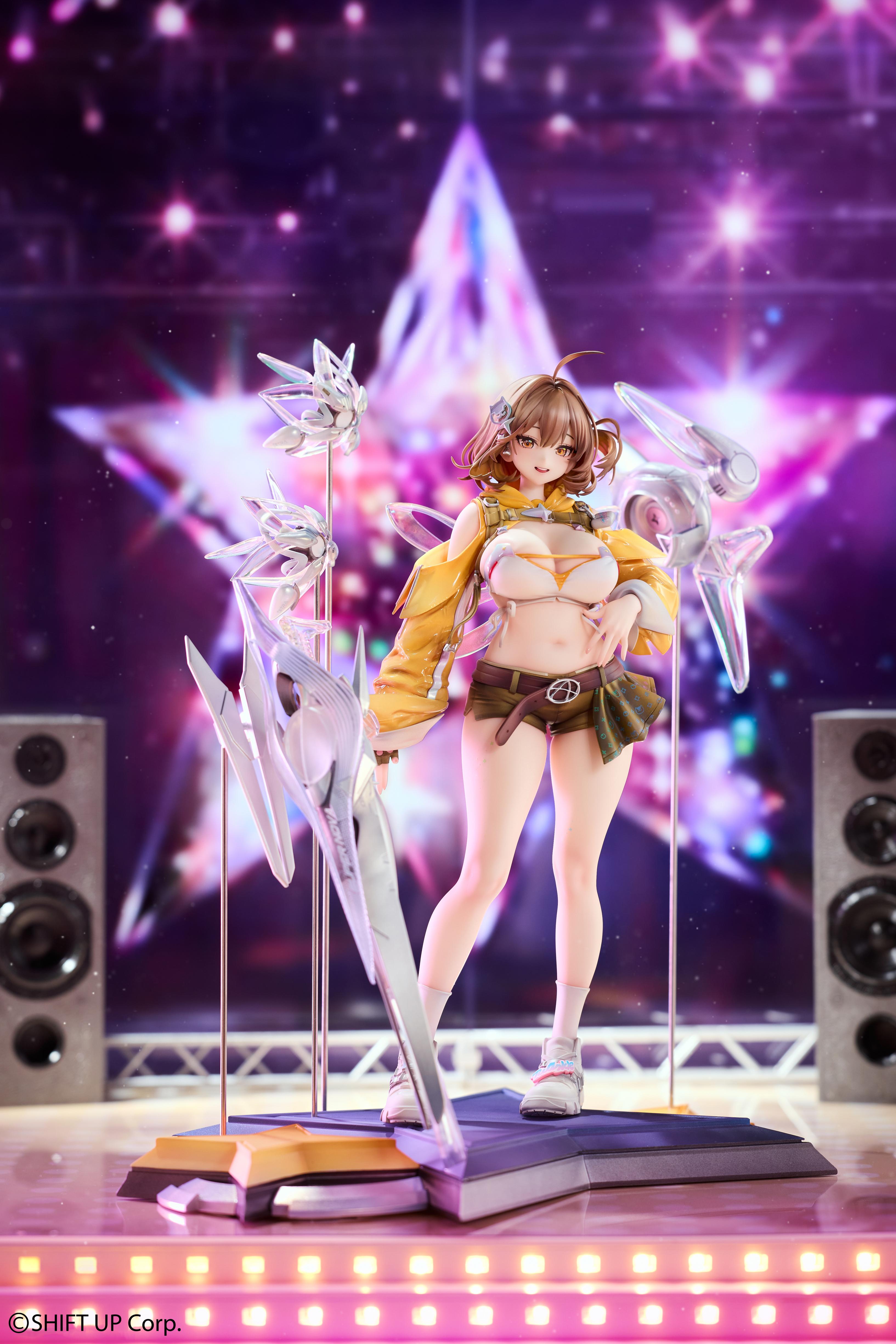 NIKKE Anis Star figure displayed on a concert stage set with star backdrop and lights