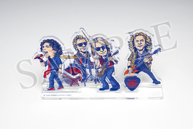 Sample of the TMG acrylic stand with cartoon versions of the four band members on one clear base