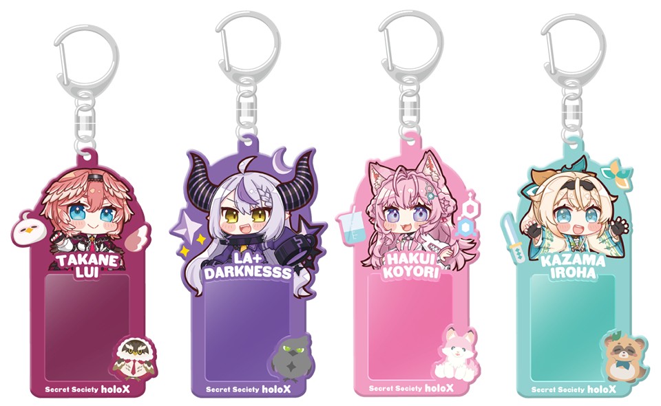 Four keyring card holders with chibi art of Takane Lui, La+ Darknesss, Hakui Koyori and Kazama Iroha above clear card windows