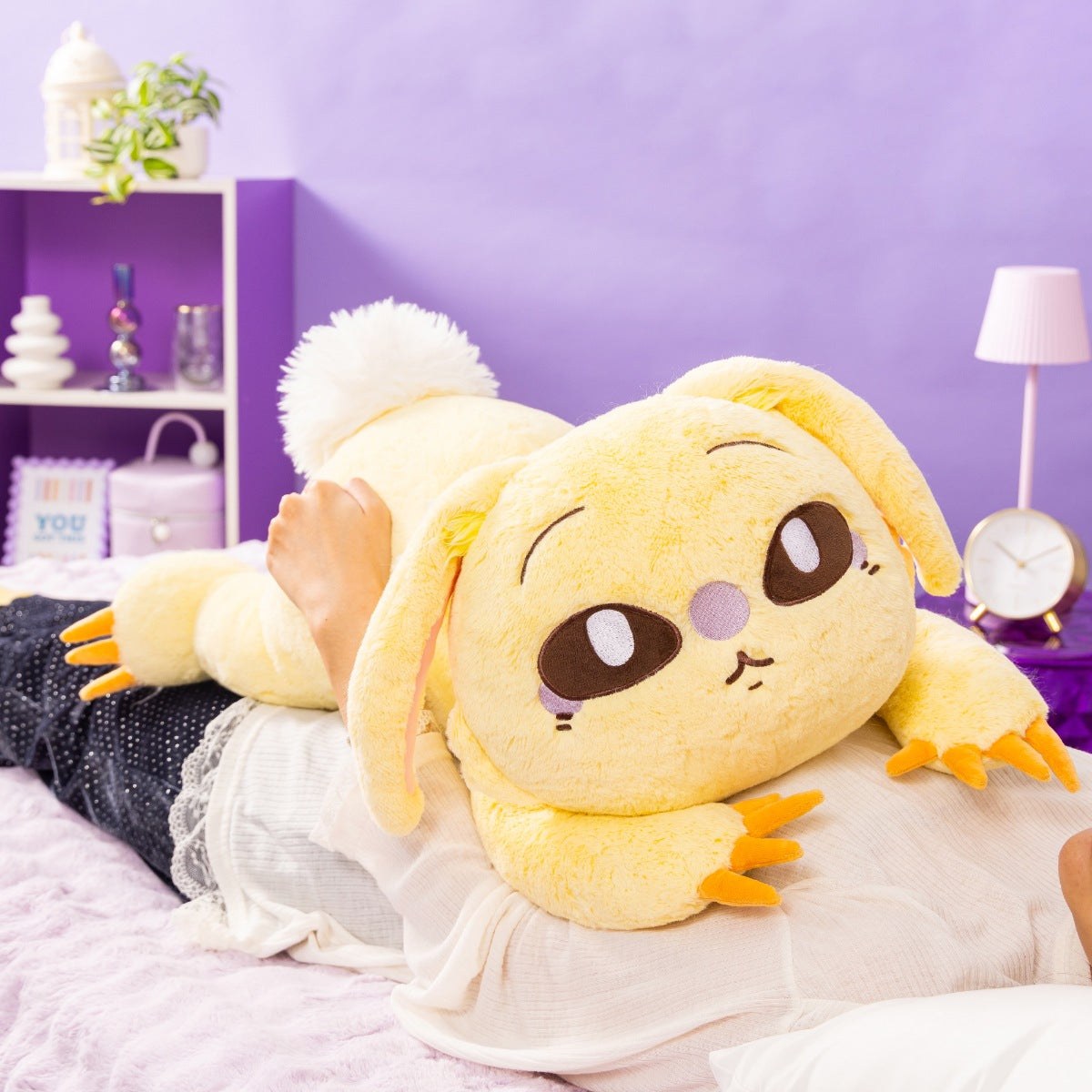 Magical Chiikawa Fluffy Mochi Rolling Hug Plush Stronger Usagi in yellow lying on a bed