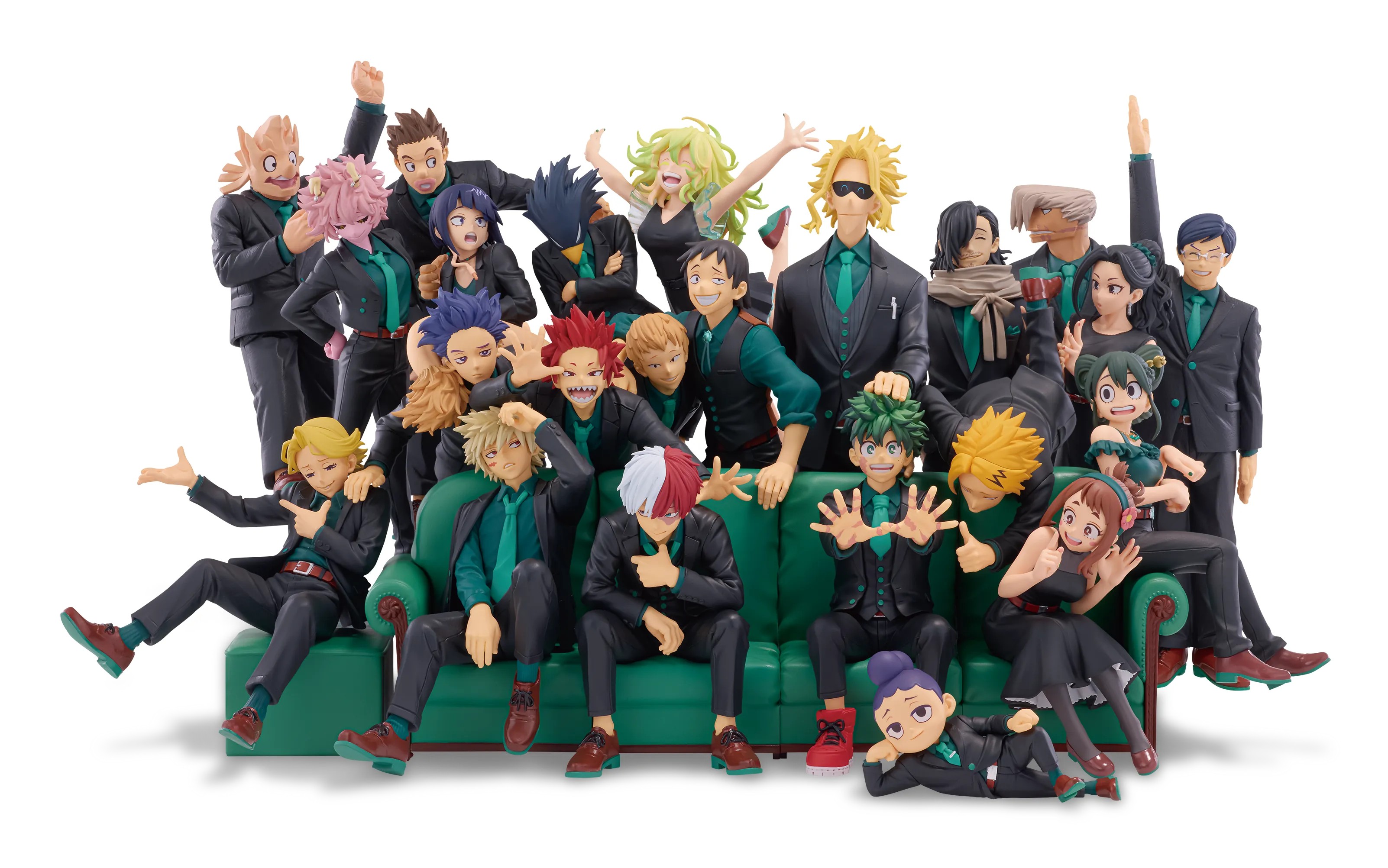 All 23 My Hero Academia 10th Anniversary Banpresto figures in suits posed together on a green sofa