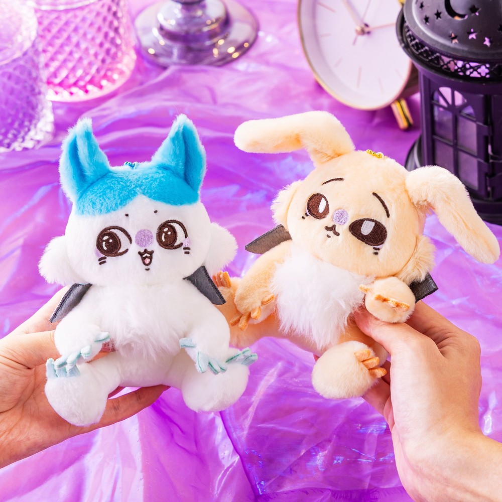 Hand holding the powered-up Hachiware and Usagi Magical Chiikawa mascots