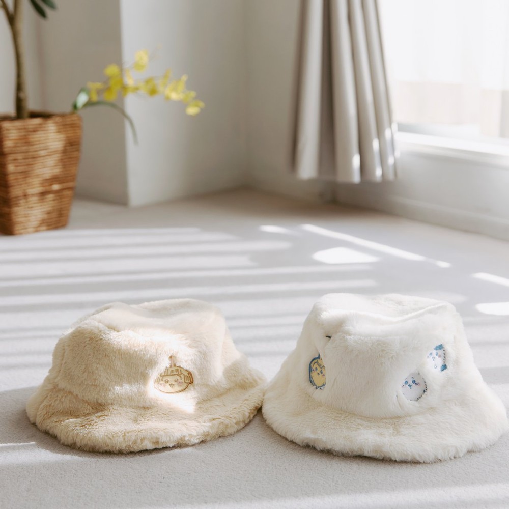 Chiikawa fur hats in fluffy Time and HAIRSTYLE CHANGE designs on a white table