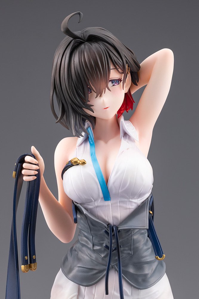 Close-up of Yumia's face and raised arm showing the red accent in her short dark hair