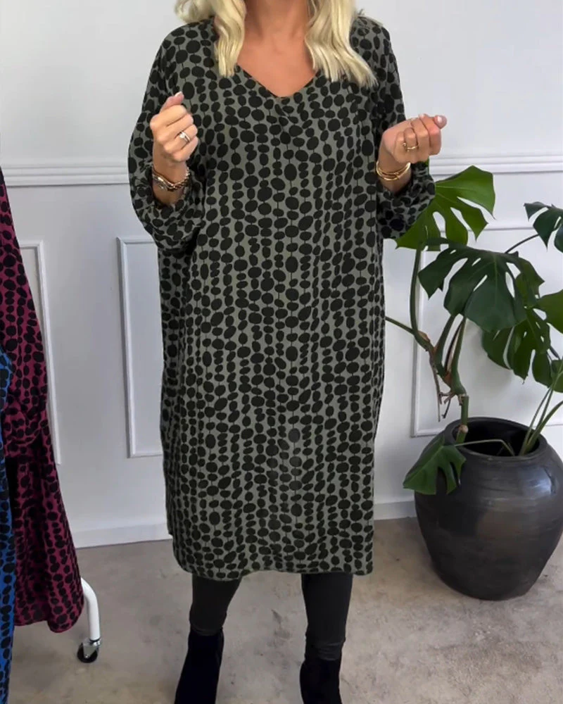 Retro puntíkované šaty s výstřihem do V