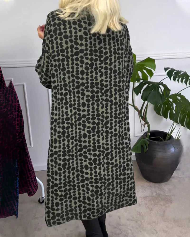Retro puntíkované šaty s výstřihem do V