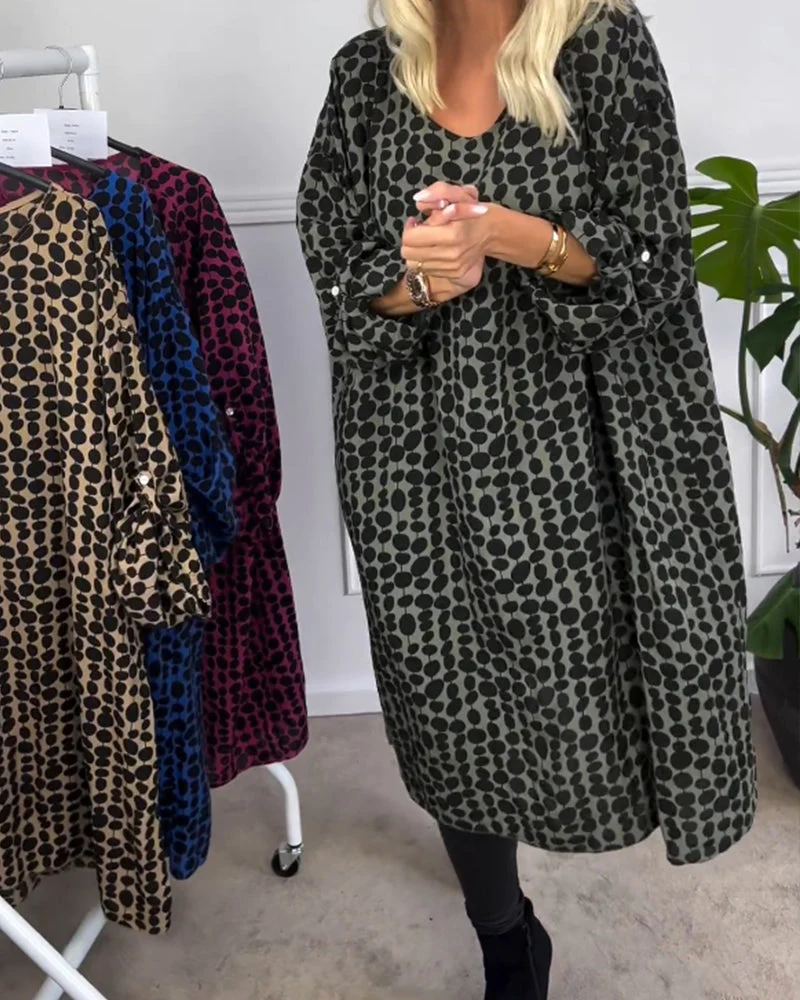 Retro puntíkované šaty s výstřihem do V