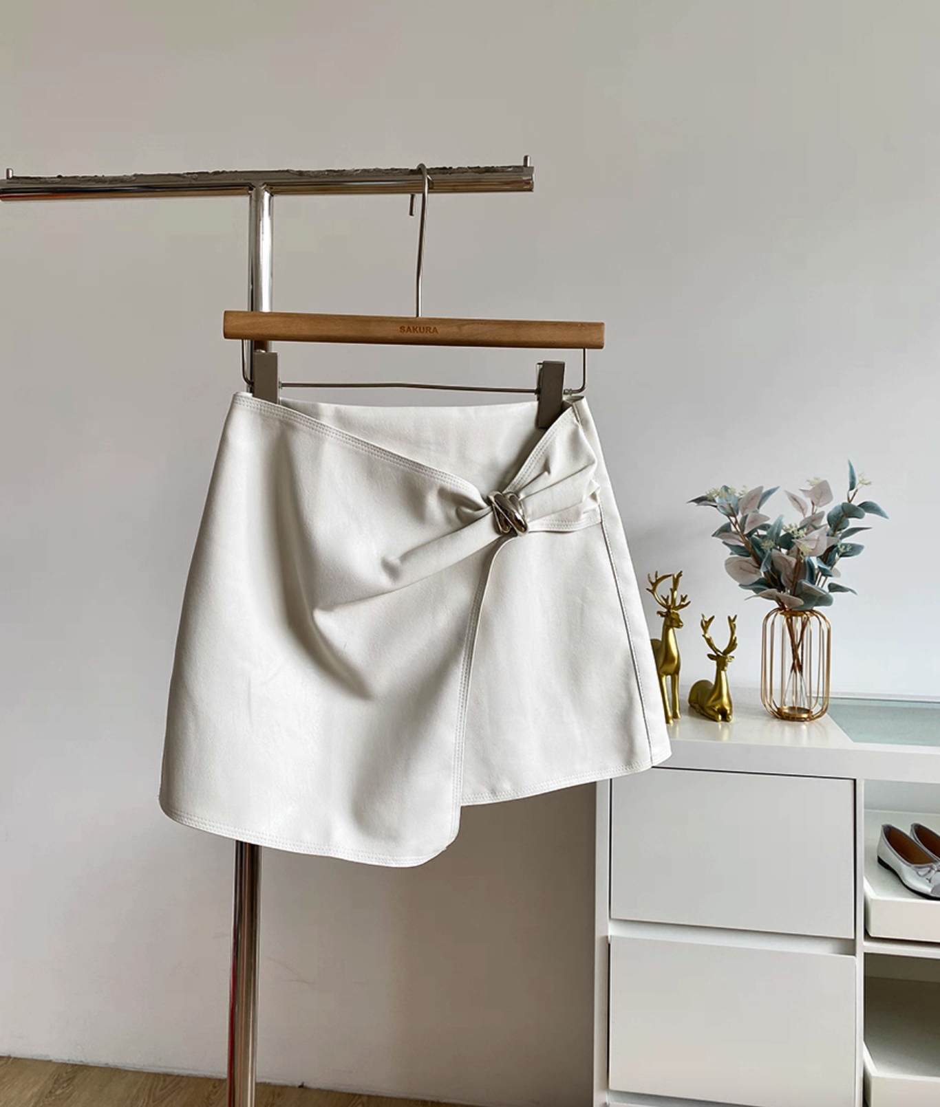 Metal-Detailed Faux Leather Wrap Mini Skirt