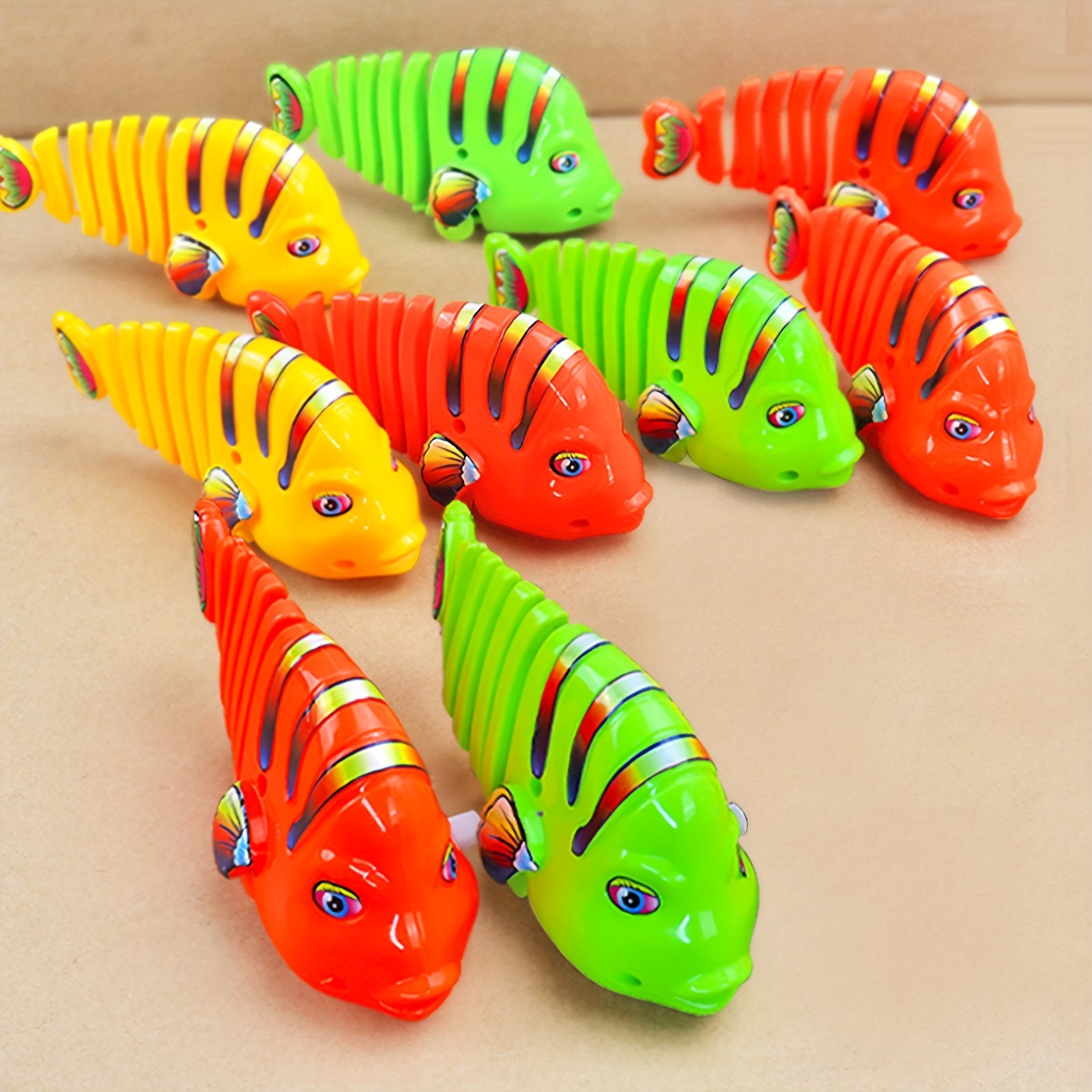 🎁2023-Christmas Hot Sale🎁 🐟Plastic Wind-Up Wiggle Fish Toys