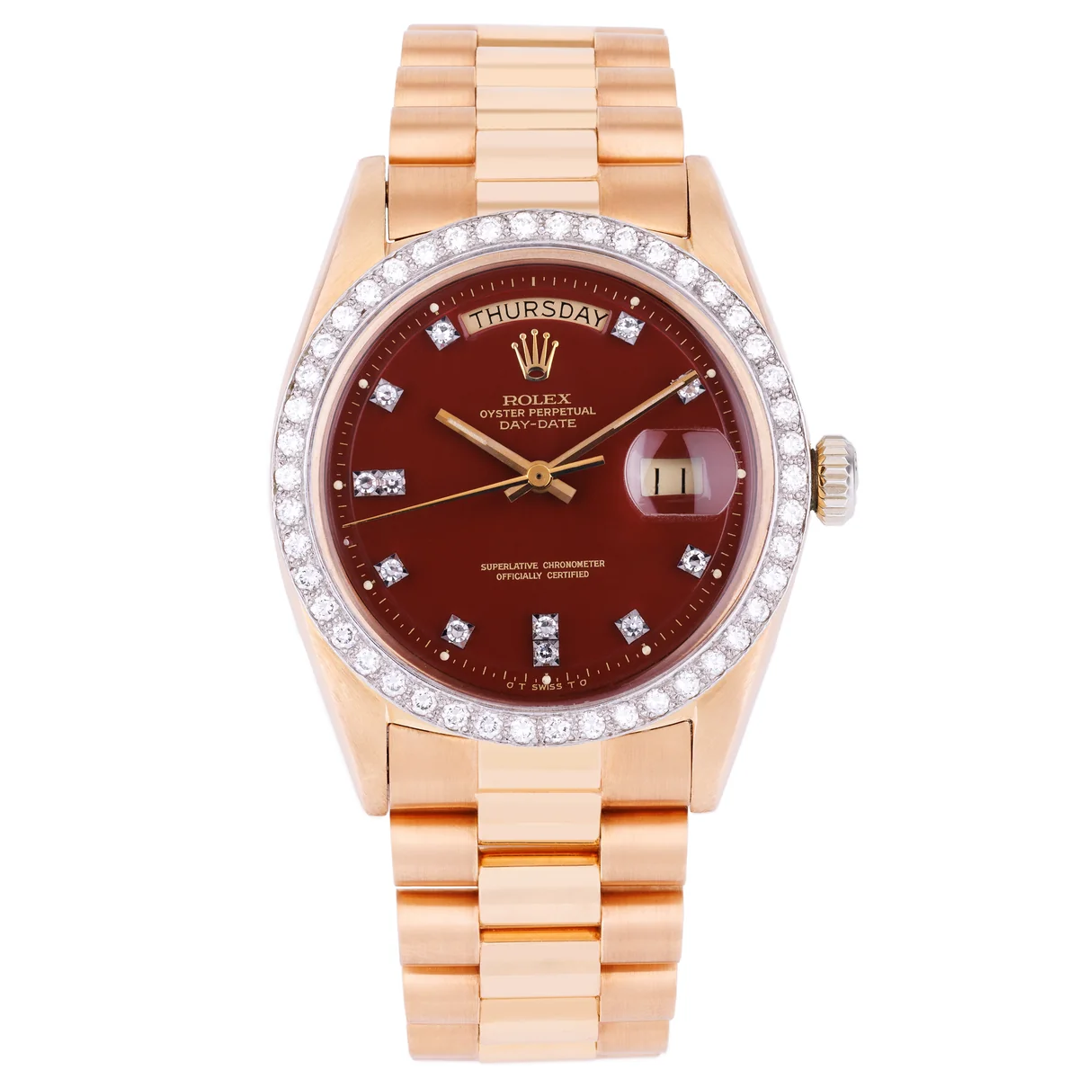 Rolex Day-Date | Ref. 1804 | Quadrante bordeaux “Stella” | Rari doppi indici con diamanti e lunetta con diamanti | Oro rosa e oro bianco 18 carati | 1973 ([Chrono24][1])  [1]: https://www.chrono24.com.au/rolex/day-date--ref-1804--oxblood-red-stella-dial